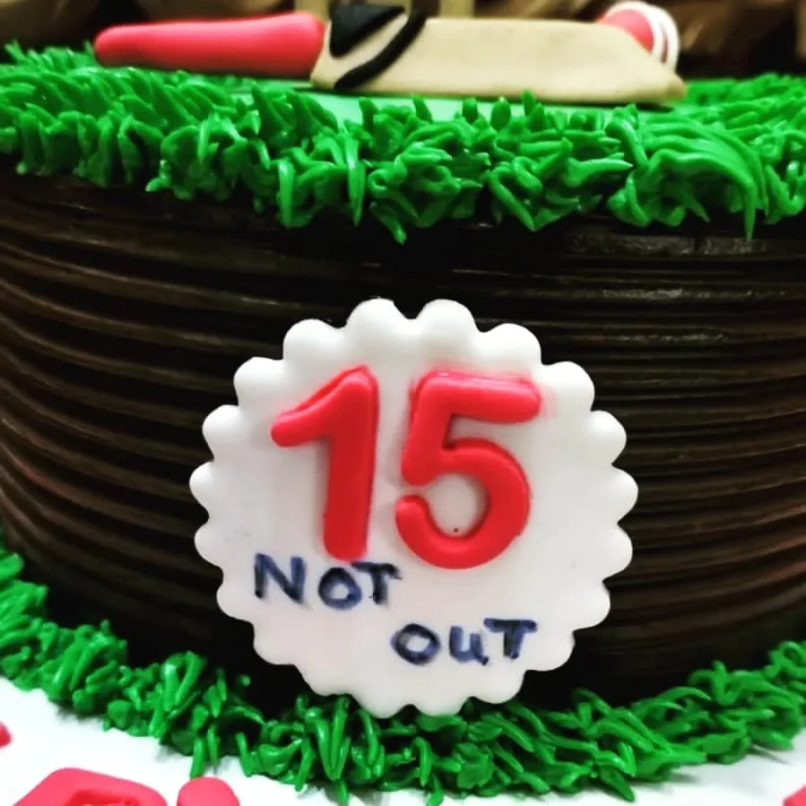 Front view of a custom cricket birthday cake in Lahore