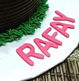 Personalised cricket birthday cake with custom name topper